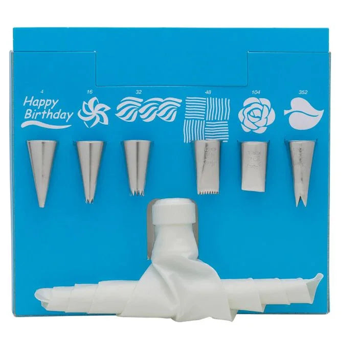 Blue cake decorating set with seven stainless steel piping nozzles and white disposable piping bag
