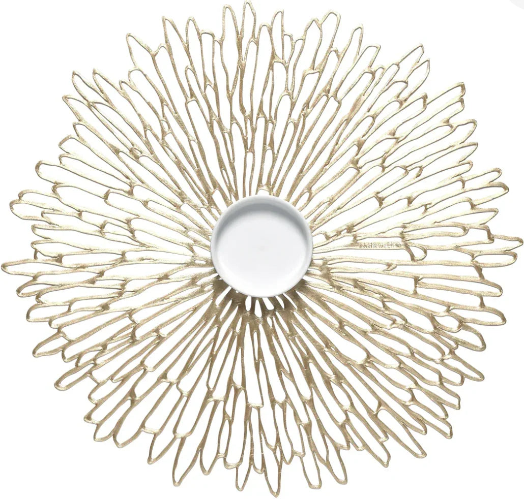 decorative placemat gold finish with small white dish on top