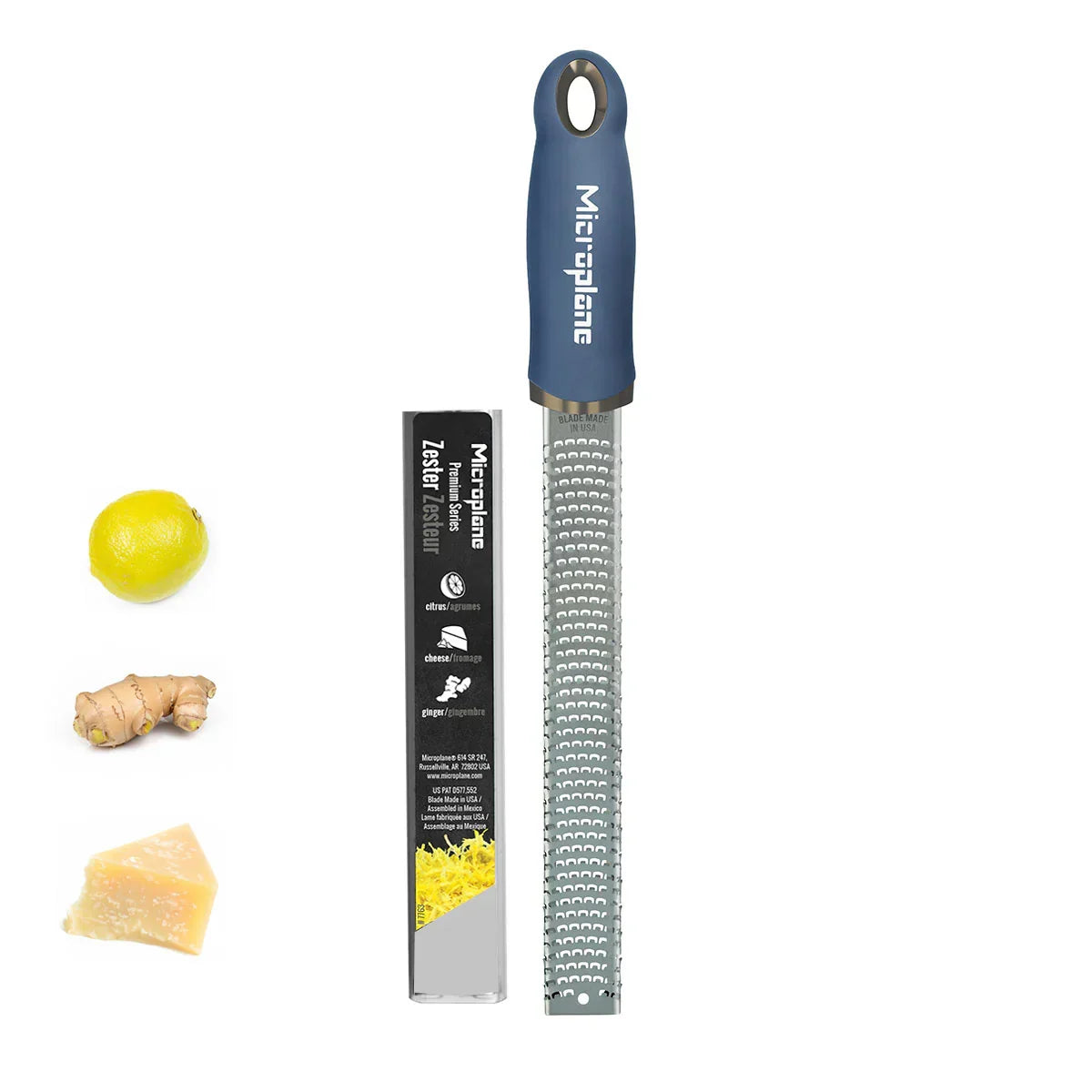 Microplane zester with a black label and illustrations of lemon, ginger, and parmesan cheese on a white background.