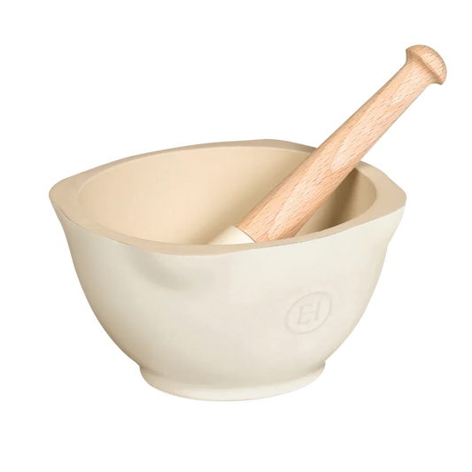 Beige ceramic mortar with wooden pestle angled inside, embossed with EH logo