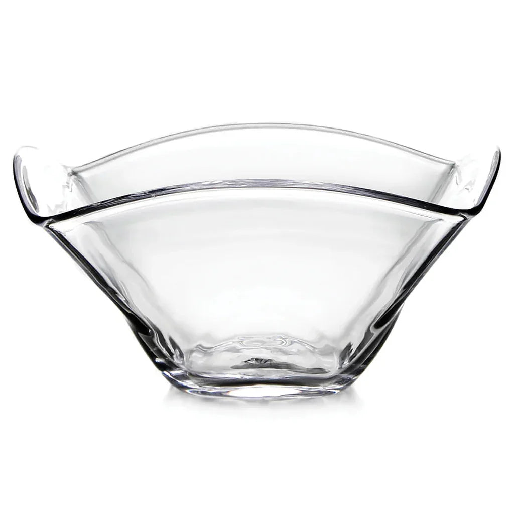 Transparent glass bowl with wide flared edges and curved geometric design