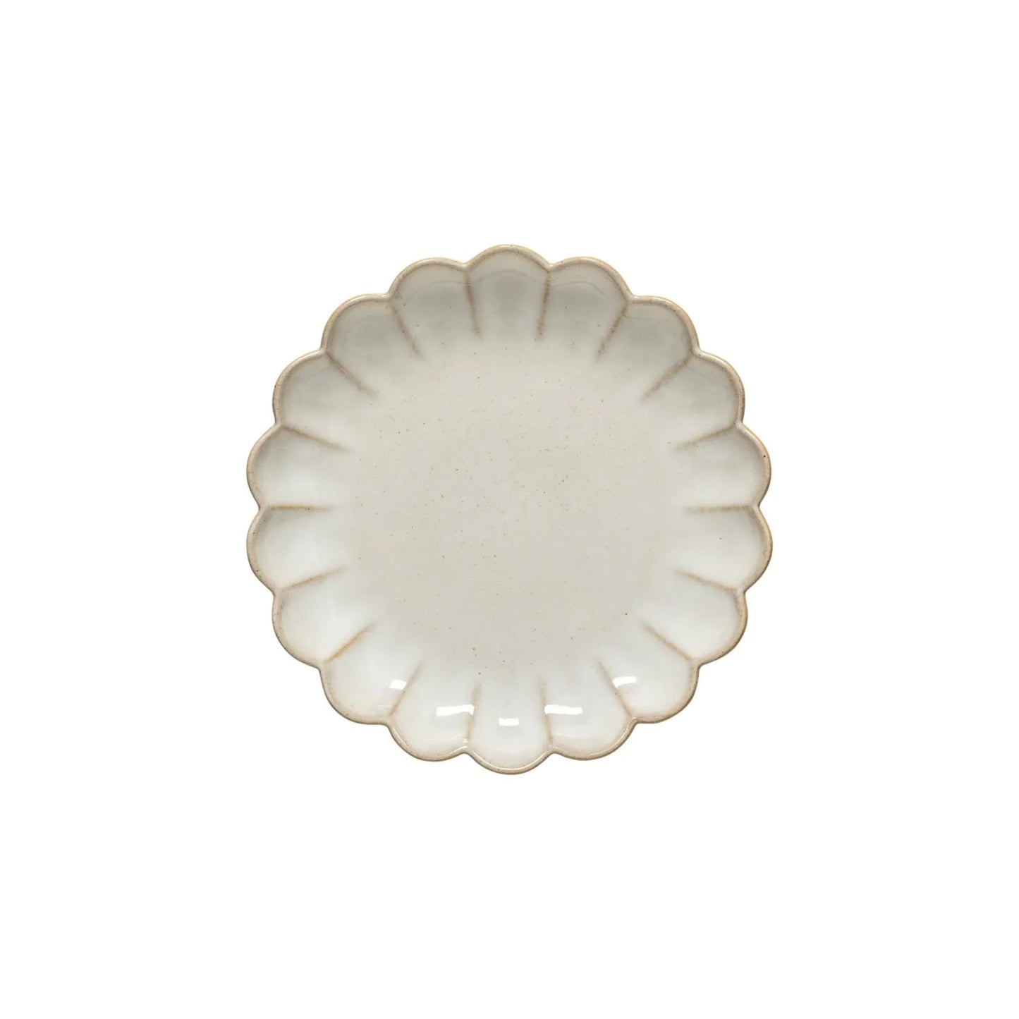 White ceramic plate with scalloped edges and subtle beige speckles