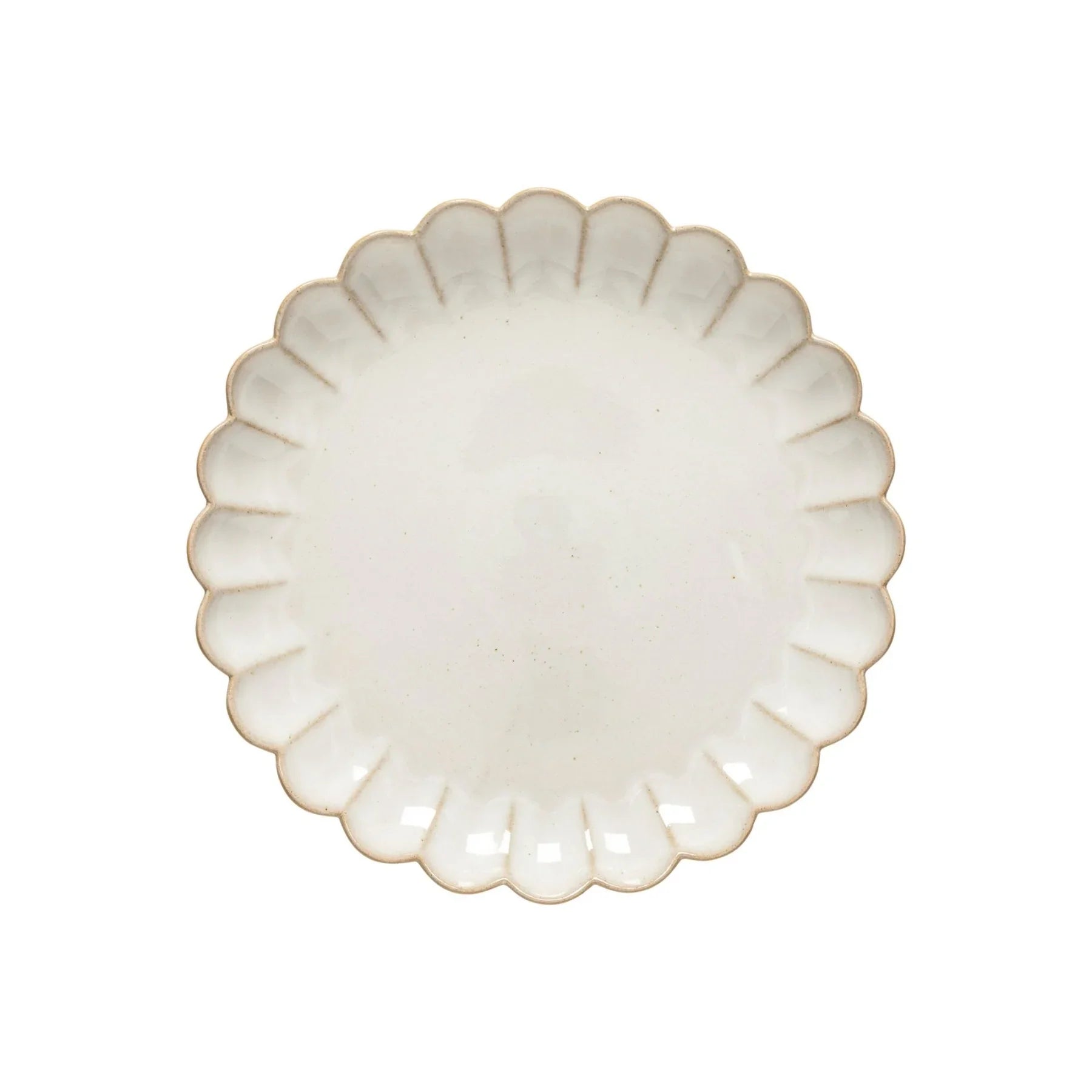 White ceramic plate with scalloped edges and subtle speckled finish on white background