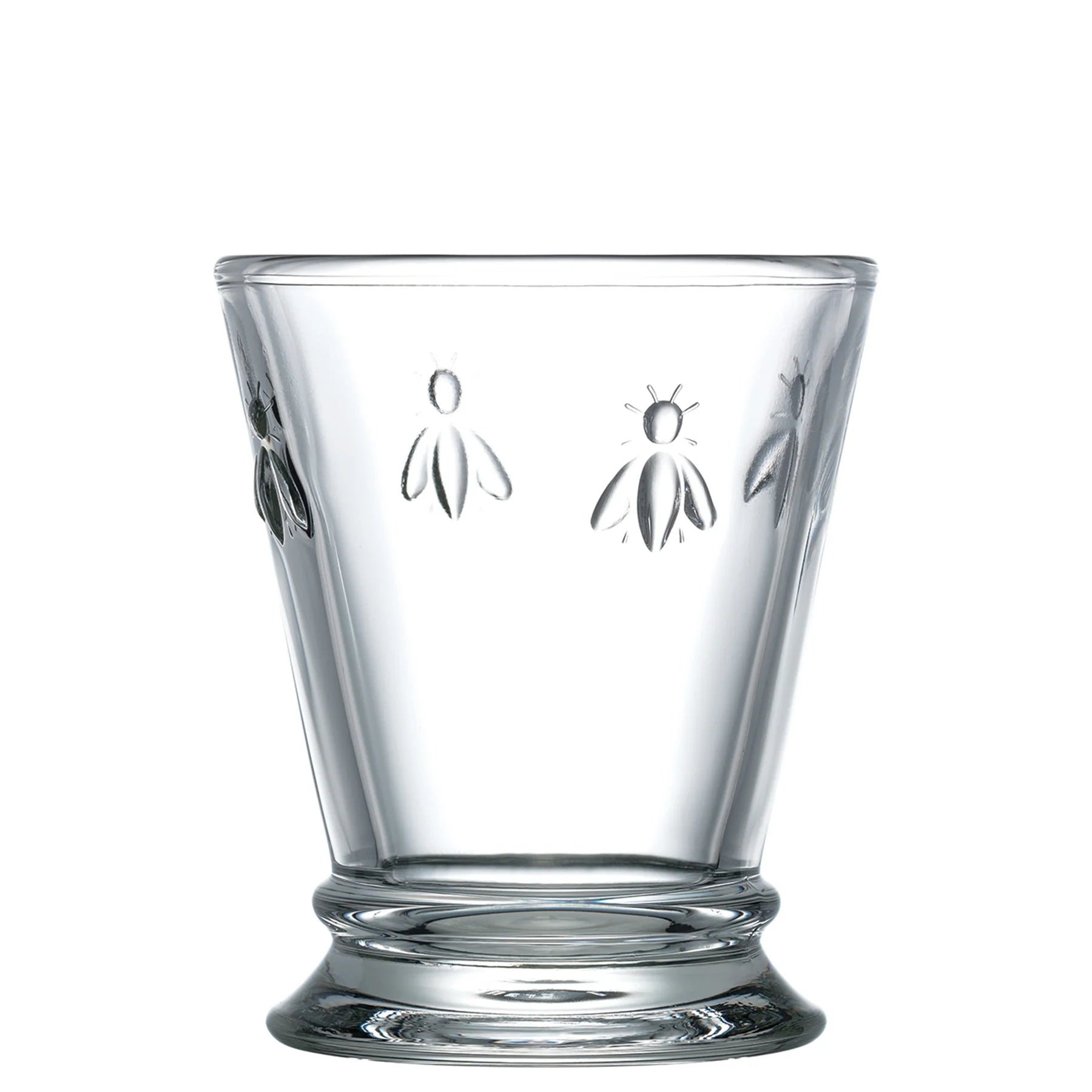 Clear glass tumbler with embossed bee designs around the upper part and a flared base
