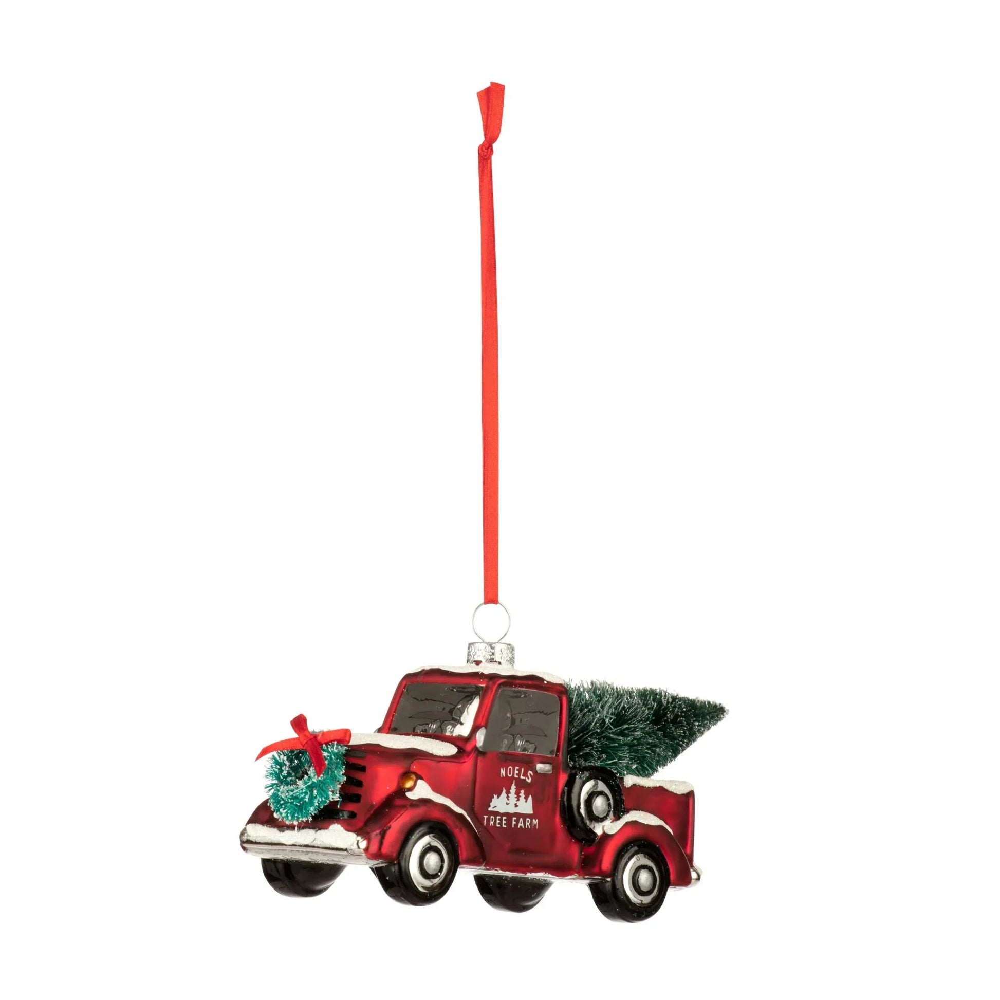 Red vintage truck Christmas ornament with tree and wreath hanging by red ribbon