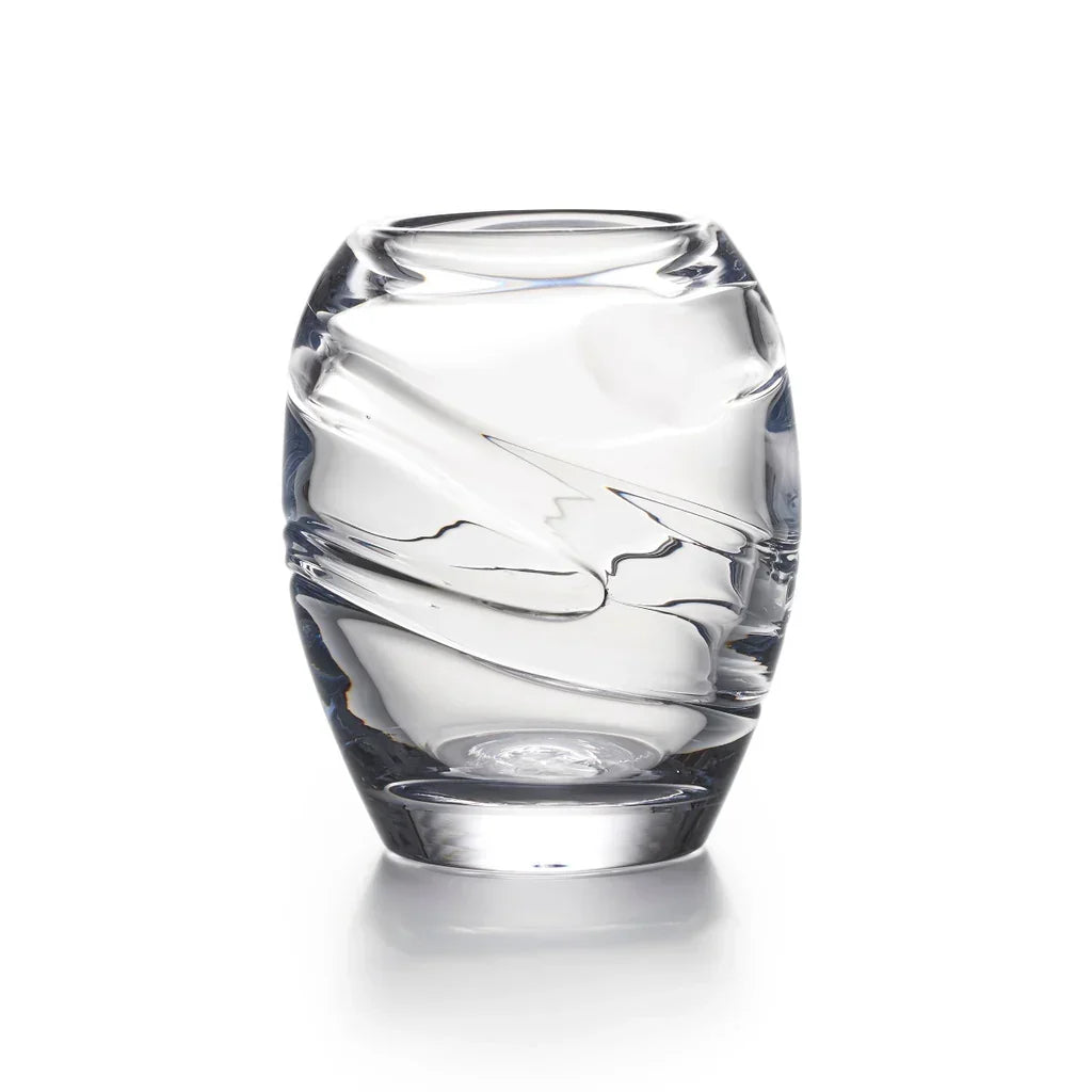 Clear glass vase with swirling twisted design on white background