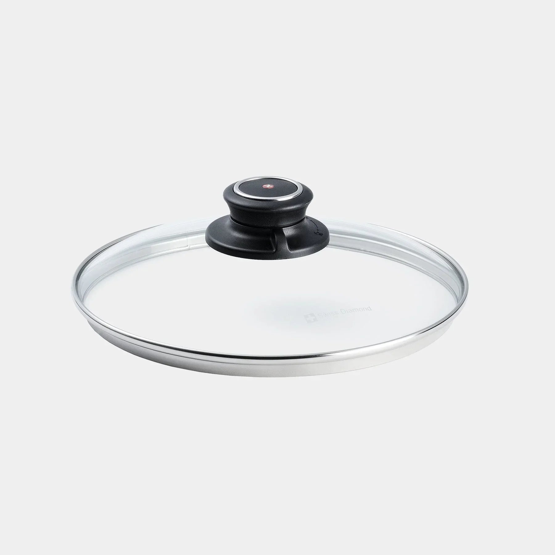 Transparent glass pan lid with black round knob handle and stainless steel rim
