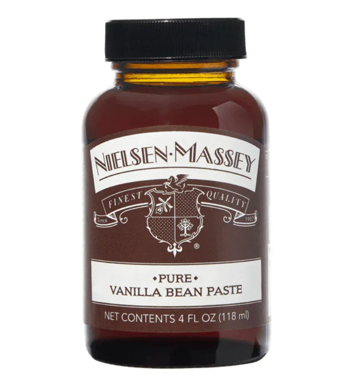 Nielsen-Massey Pure Vanilla Bean Paste in a 4 fl oz amber glass bottle with black cap