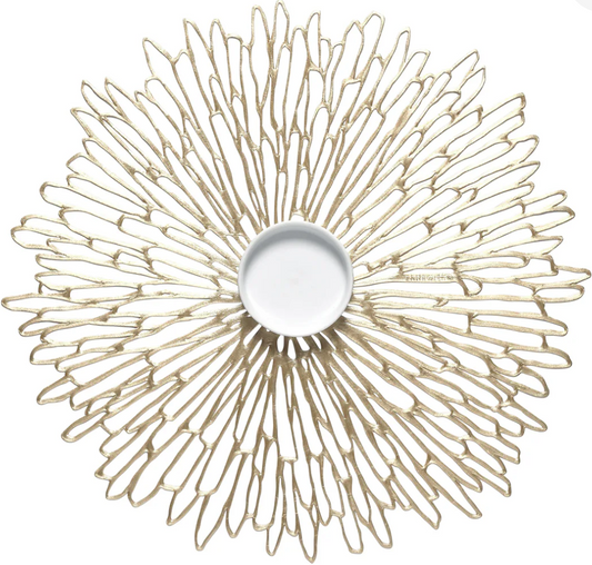 decorative placemat gold finish with small white dish on top