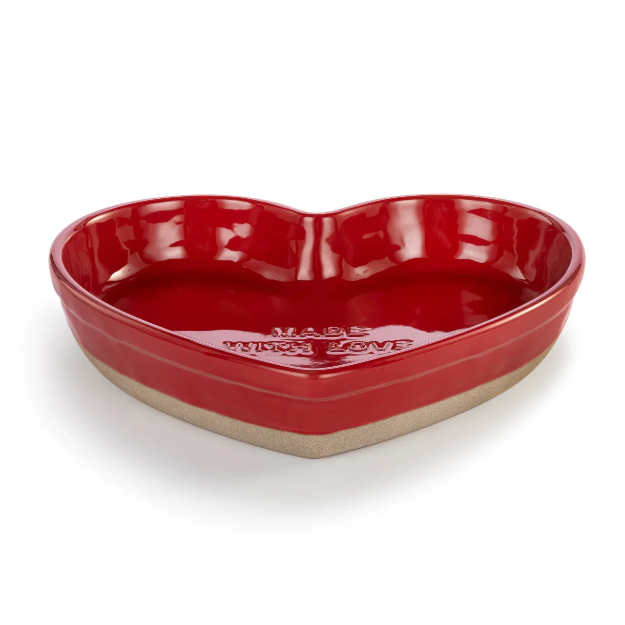 Heart-shaped red ceramic baking dish with embossed text inside