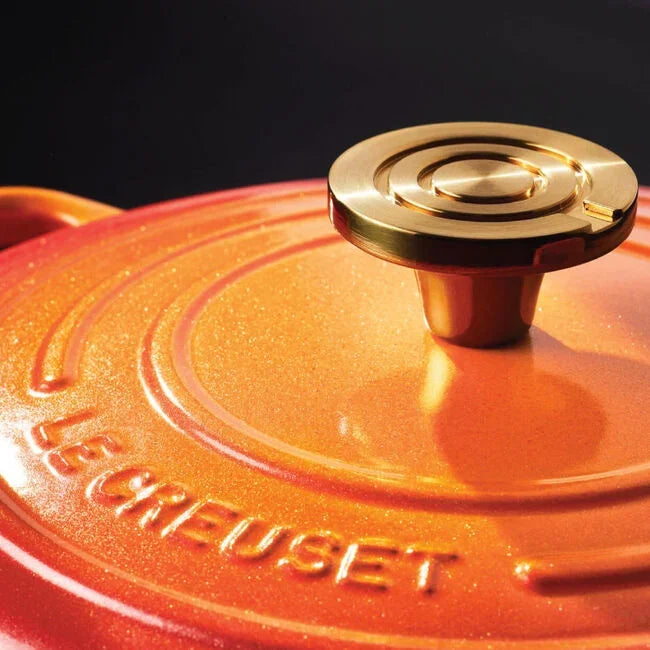 Le Creuset Flamme Doree Signature Round Dutch Oven with Crucible Knob - 4.5 Qt closeup of lid knib