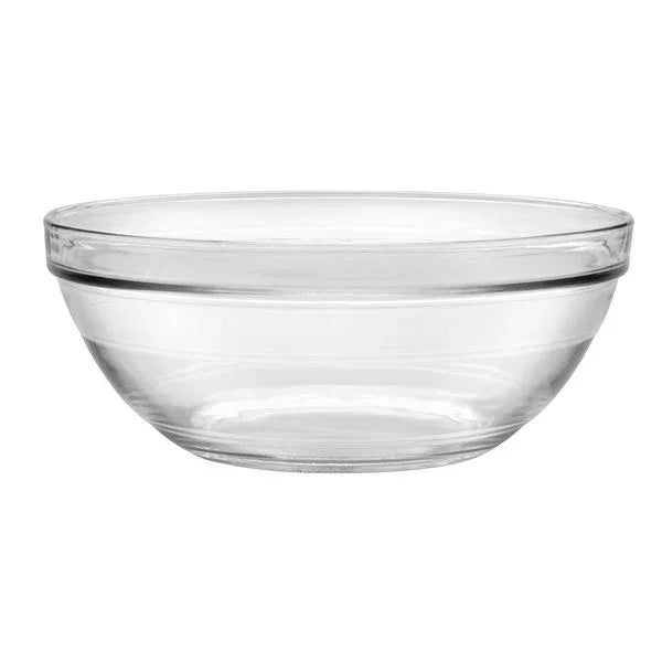 Clear transparent glass mixing bowl with smooth rounded sides on white background