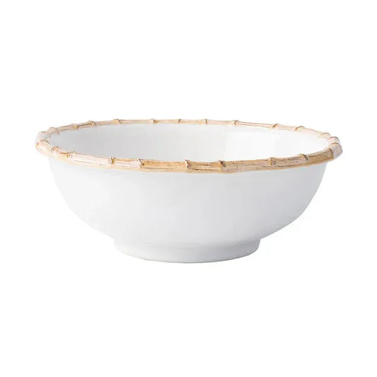 white ceramic serving bowl with bamboo style painted rim