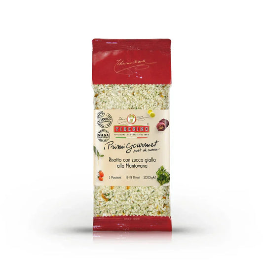 Package of Tiberino Risotto con zucca gialla alla Mantovana with visible grains of Carnaroli rice and pumpkin pieces