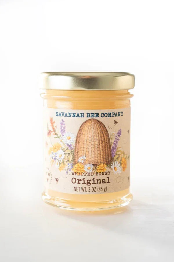 3 oz jar of Savannah Bee Company original whipped honey with floral label and golden lid
