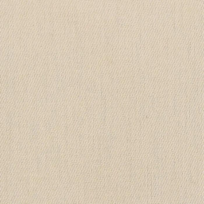 Close-up of beige textured fabric background with subtle woven pattern