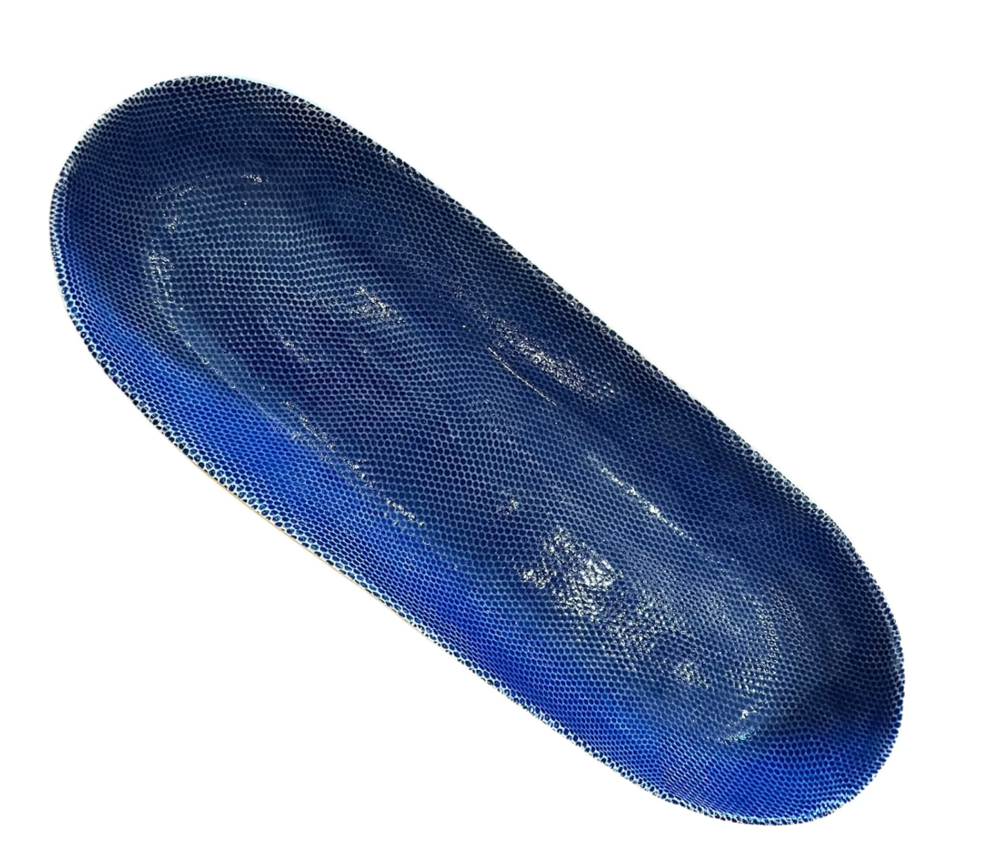 ceramic baguette tray with honeycomb pattern and cobalt blue glaze