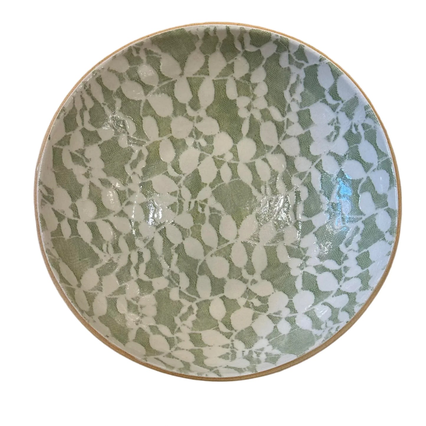 Ceramic serving bowl with green and white pattern