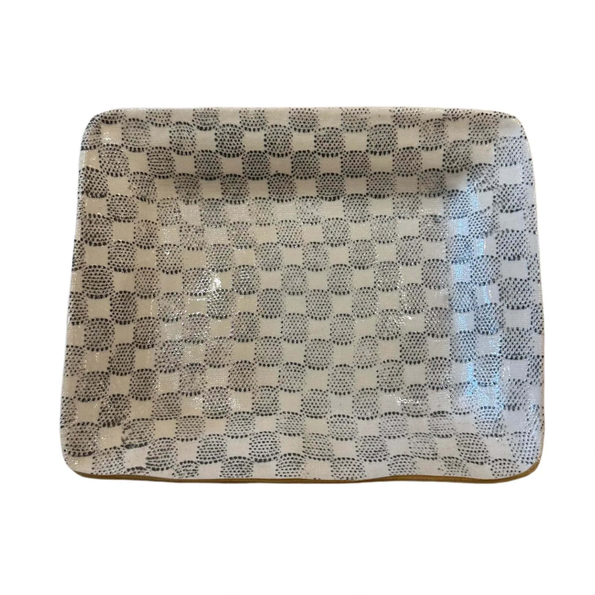 Rectangular ceramic plate with a checkered pattern