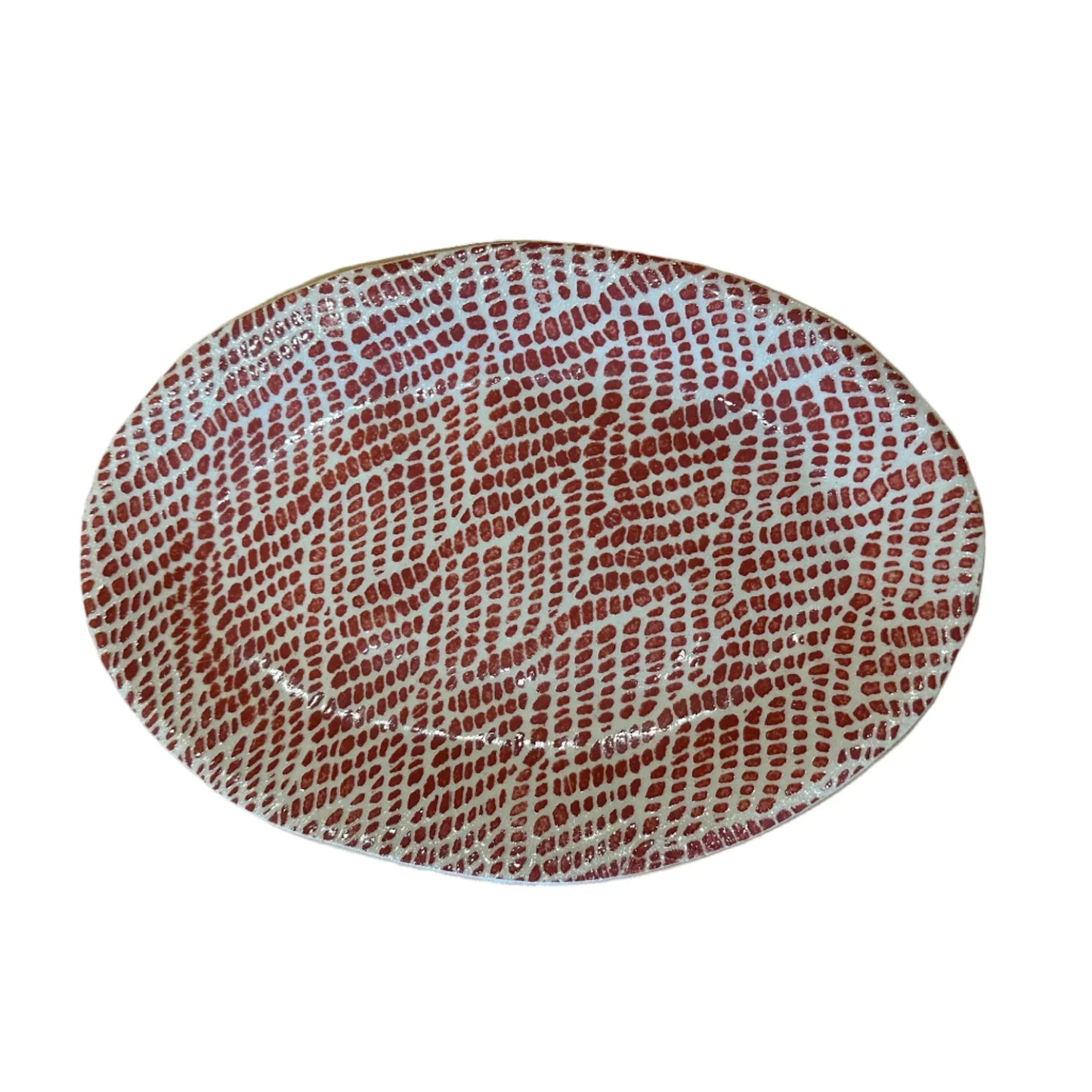 Oval ceramic plate with rust red pattern