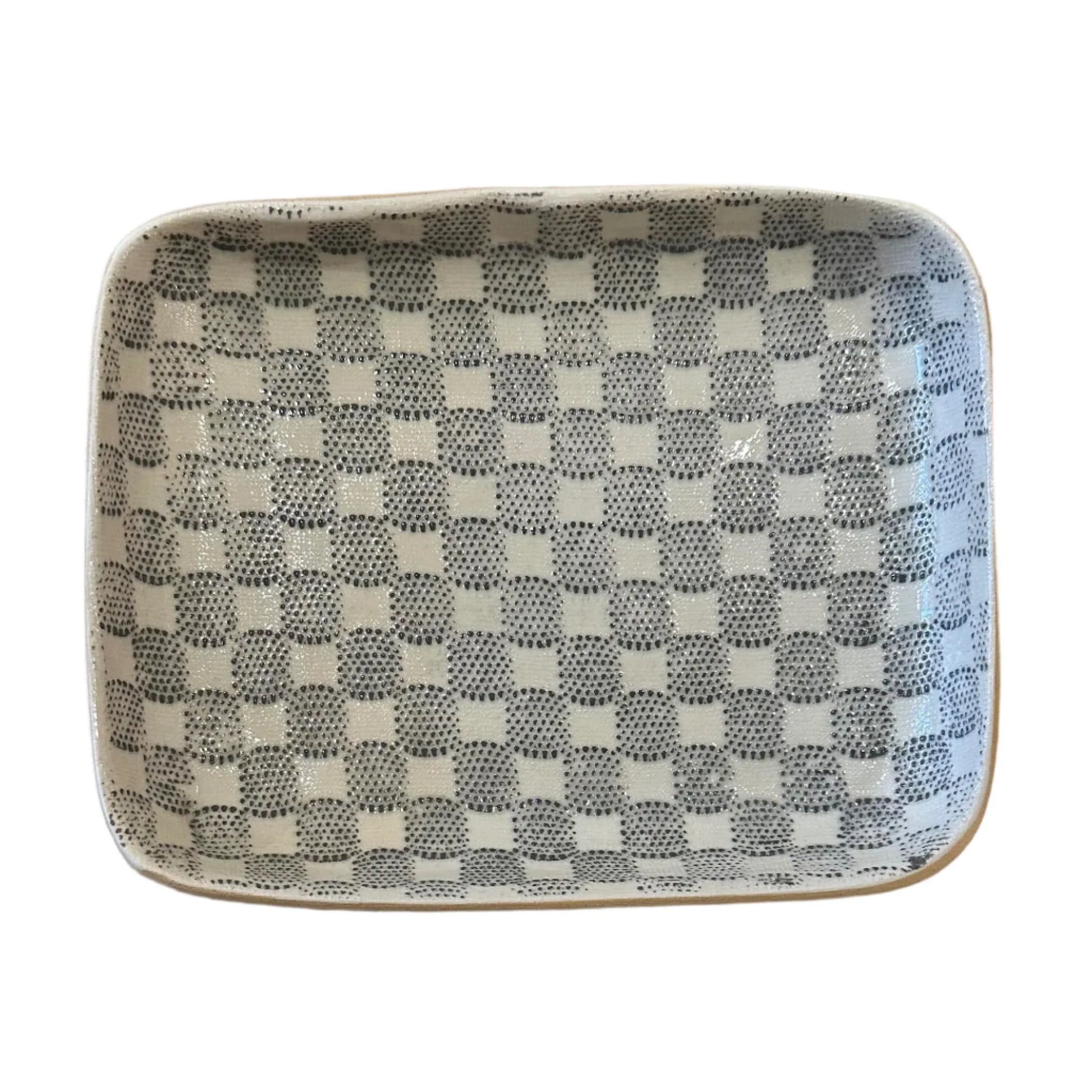 Rectangular ceramic tray with a checkered pattern