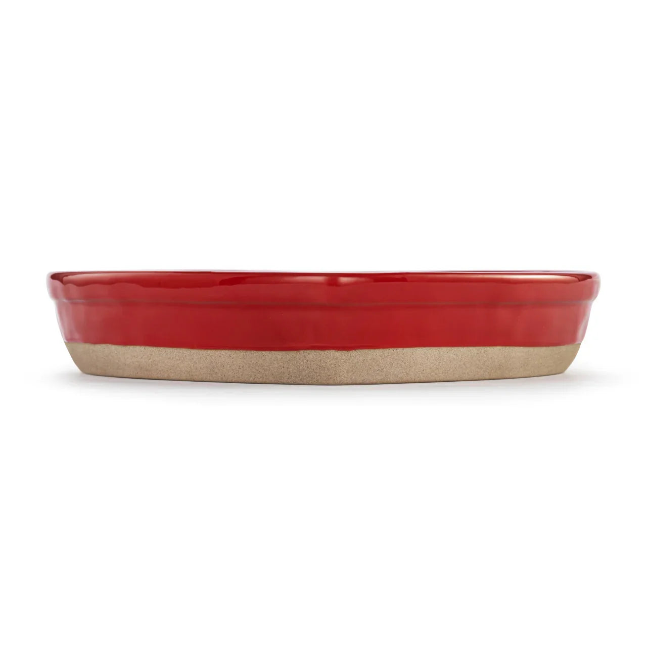 Oval ceramic red baking dish with natural beige unglazed base isolated on white